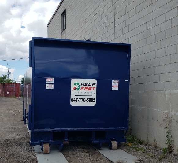 Black plastic dumpster. Street large garbage containers